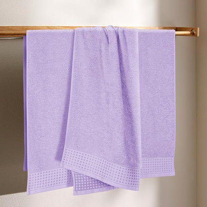 GLAMBURG Ultra Soft 4 Pack Oversized Bath Towel Set 27x54 inches, 100% Cotton Bath Towels, Highly Absorbant Compact Quickdry & Lightweight Towel, Ideal for Gym Travel Camp Pool - Purple