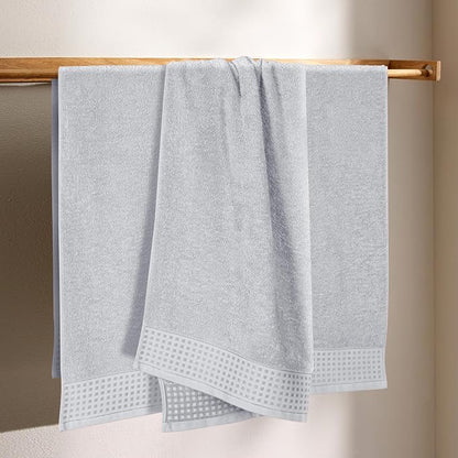 GLAMBURG Ultra Soft 4 Pack Oversized Bath Towel Set 27x54 inches, 100% Cotton Bath Towels, Highly Absorbant Compact Quickdry & Lightweight Towel, Ideal for Gym Travel Camp Pool - Light Grey