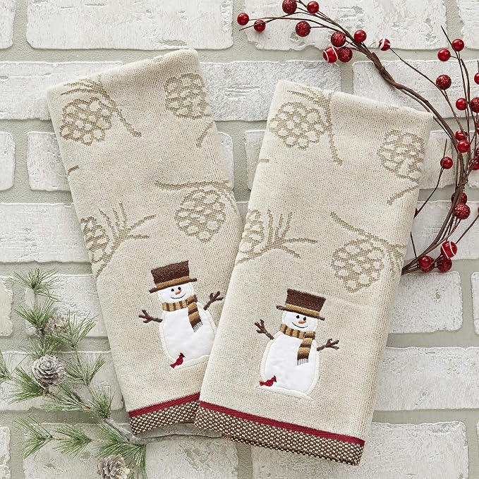 SKL Home Woodcut Snowman Hand Towel | 100% Cotton. Soft & absorbent pinecone jacquard with embroidery. Great for the bathroom, kitchen or bar & holiday gifting.
